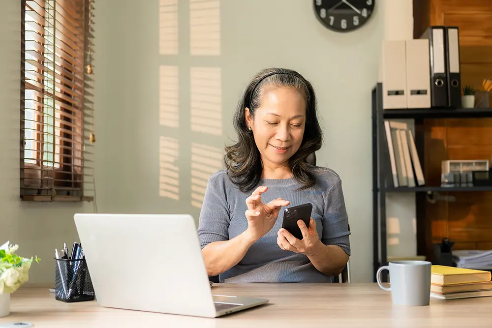 call-cpa Woman at a desk dialing a phone number
